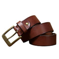 The Classic Belt in rich brown with a brass buckle, shown coiled against a plain background.