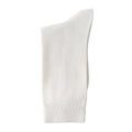 The Essential Dress Sock in white, shown flat with a ribbed cuff.