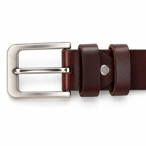 The Modern Belt in dark brown leather with a brushed silver buckle and adjustable strap shown against a white background.