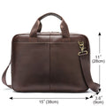 The Modern Briefcase in dark brown with sturdy handles and a detachable shoulder strap.