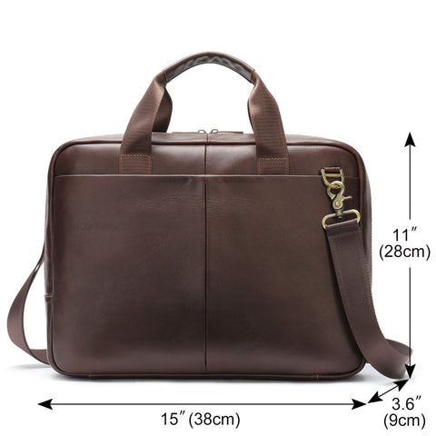 The Modern Briefcase in dark brown with sturdy handles and a detachable shoulder strap.