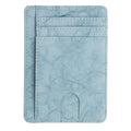 The Modern Cardholder in light blue with multiple card slots and a minimalist design.