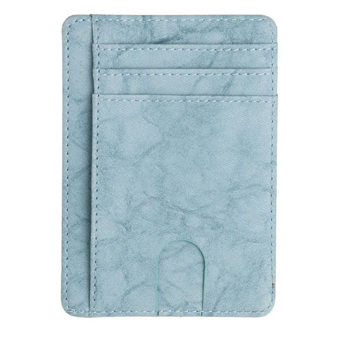 The Modern Cardholder in light blue with multiple card slots and a minimalist design.