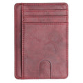 The Modern Cardholder in red with a slim, compact design and multiple card slots
