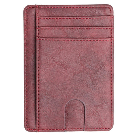 The Modern Cardholder in red with a slim, compact design and multiple card slots