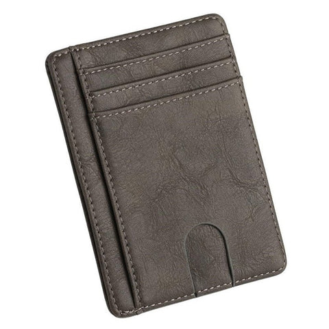 The Modern Cardholder in dark gray with multiple card slots and a slim profile.