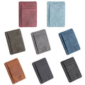 Seven slim cardholders in red, light blue, brown, black, and shades of gray, shown side by side.