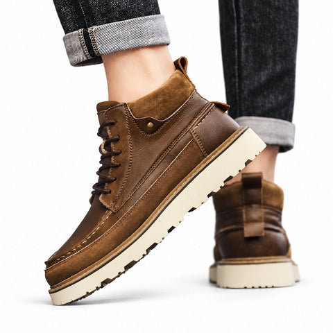 Timberline brown lace-up boots worn with cuffed jeans for a discreet height boost
