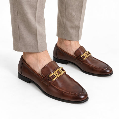 Whitmore brown leather loafers with a gold-tone metal bit and stitched vamp styled with tailored trousers for a discreet height boost