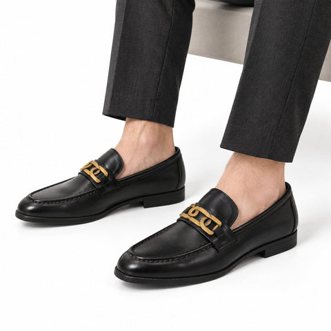 Whitmore black leather loafers with a gold-tone metal bit and polished finish for a discreet height boost