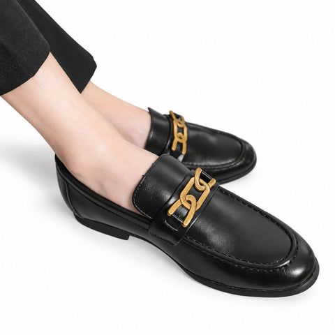 Whitmore black leather loafers with a gold-tone metal bit and a discreet height boost